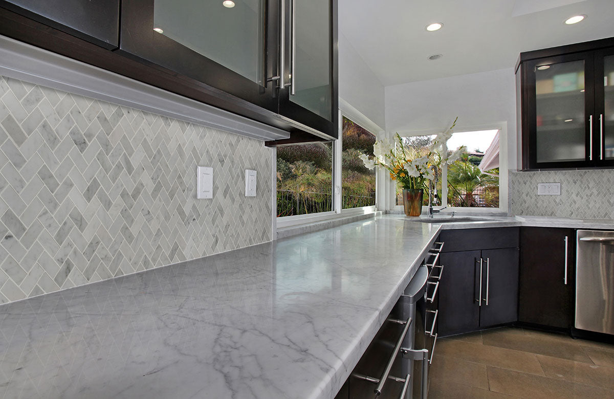carrara-white-1×2-herringbone-honed-a