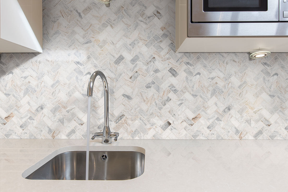 capri-blue-1×2-herringbone-honed-a